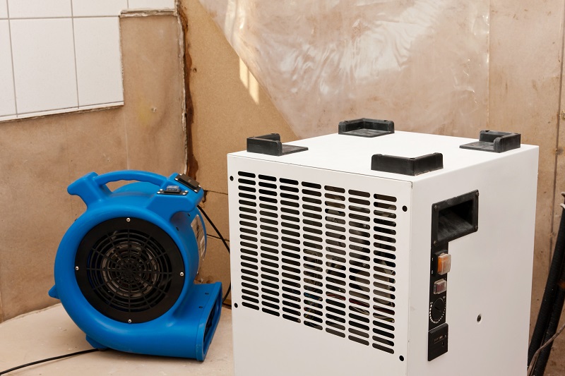 Removing drywall water damage with a high-volume air mover